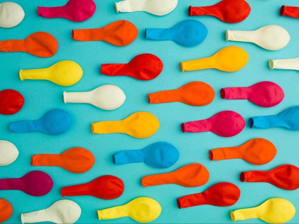 colorful deflated balloons to represent sperm count